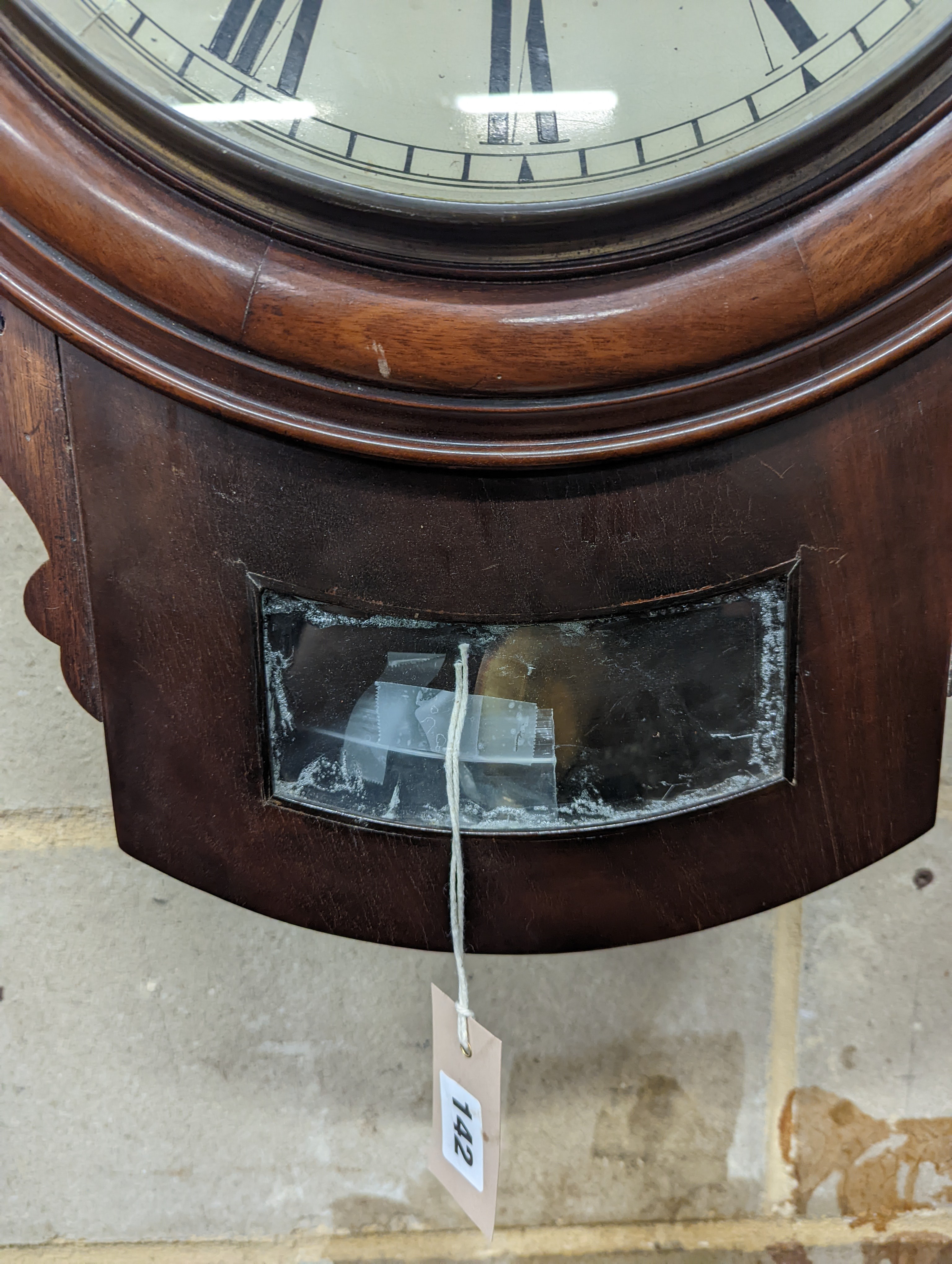 A Victorian mahogany drop dial wall clock, with twin fusee movement, and circular white painted Roman dial signed 